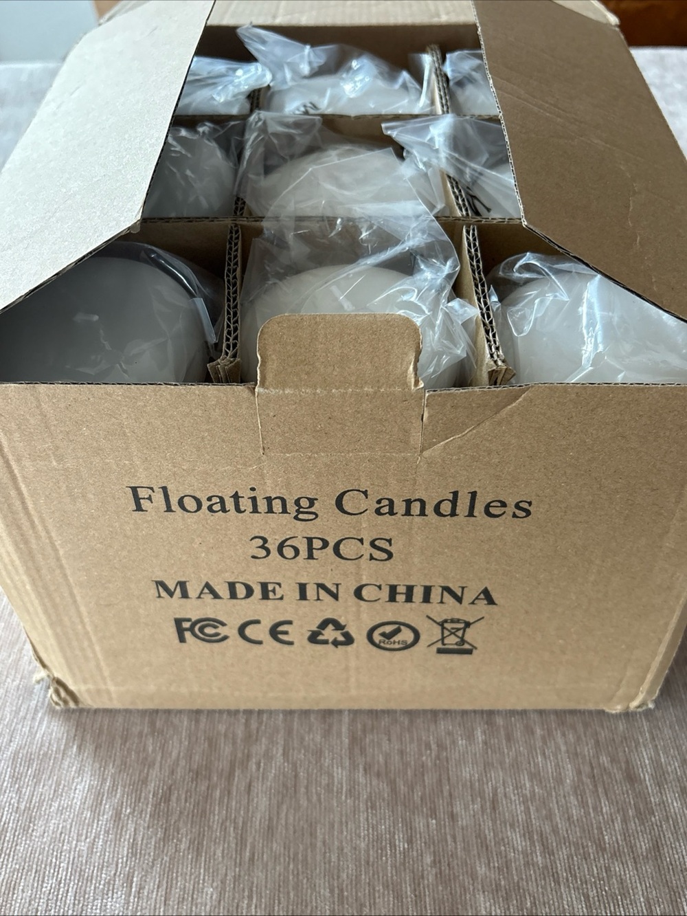 Tuyai (Set of 36) Floating Candles, 3 inch White Dripless Wax Burning Candles - Picture 4 of 5